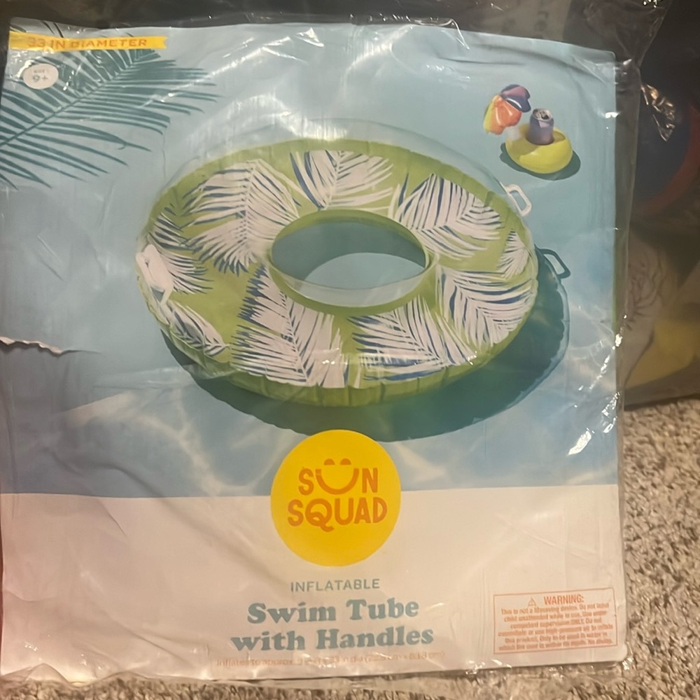 Sun squad inflatable swim tube with handles. NIP